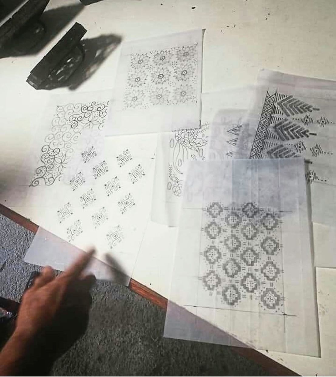 Batik block designs are replicated onto A4 paper sheets.