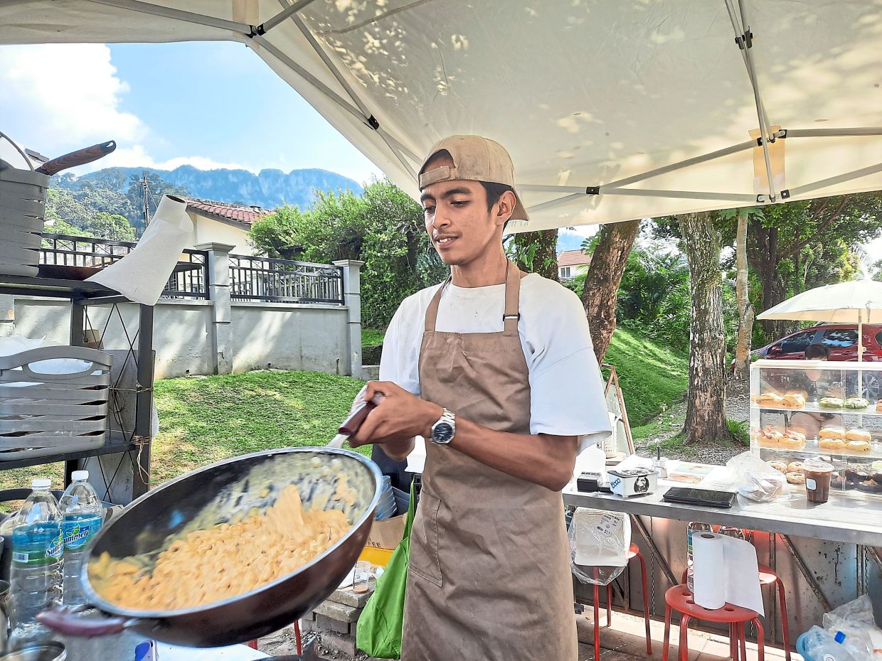 Manoj cooking Bluum’s Mac & Cheese.