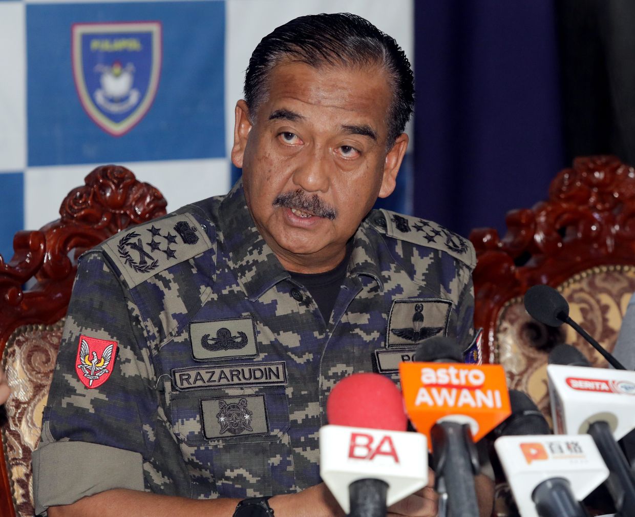 IGP Tan Sri Razarudin Husain (center) having a press conference together with Health Ministry, Jakim and Welfare Department on Global Ikhwan.—SAMUEL ONG/The Star