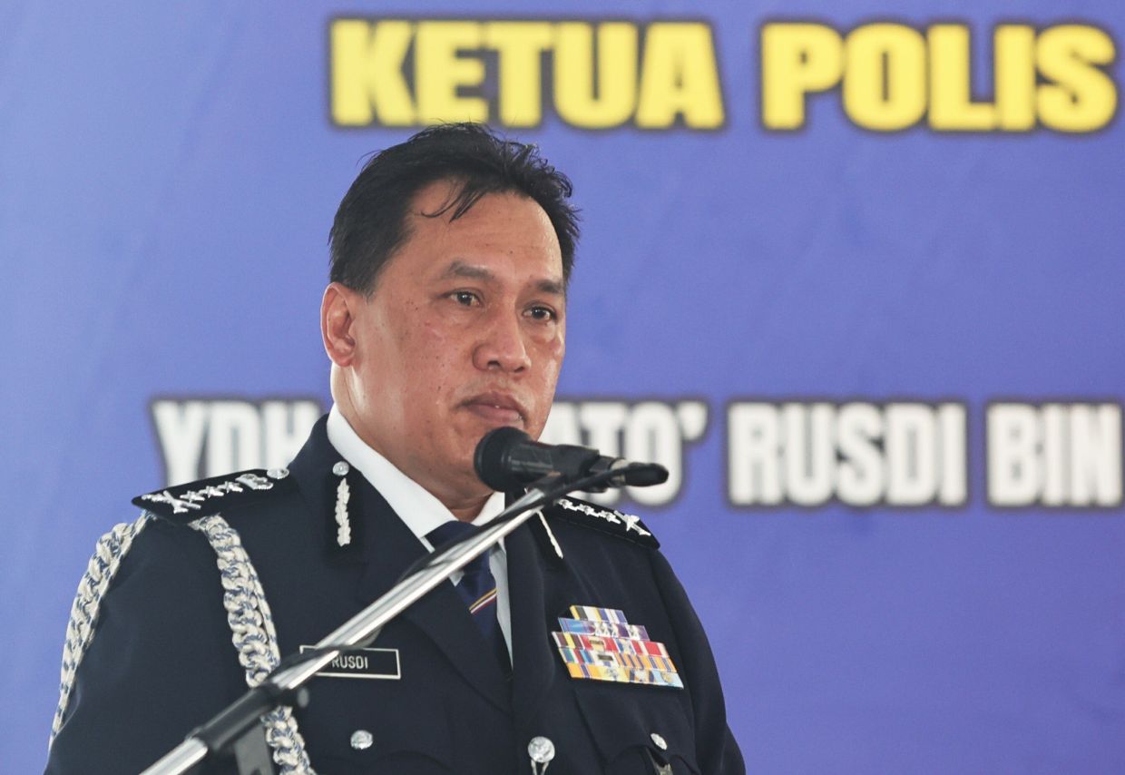 Kuala Lumpur Police Chief Datuk Rusdi Mohd Isa delivered his speech after witnessing the Dang Wangi OCPD position handing over and received ceremony between ACP Noor Dellhan Yahaya to Supt. Nuzulan Mohd Din at IPD Dang Wangi on July 29.—AZMAN GHANI/The Star
