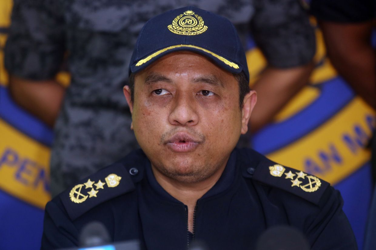 Road Transport Department (JPJ) Deputy director-general (planning and operations) Aedy Fadly Ramli speaking to the press during the kick-off of Ops Hari Raya Aidiladha at Sungai Besi Toll on Wednesday night. — IZZRAFIQ ALIAS/The Star