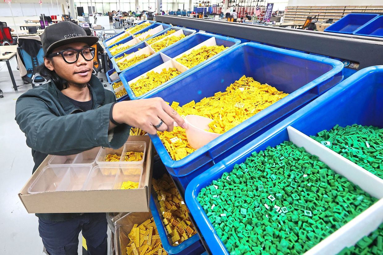 Merlin Magic Making (MMM) serves as the creative force behind the intricate model designs at Legoland Malaysia, bringing iconic landmarks to life brick by brick. — THOMAS YONG/The Star