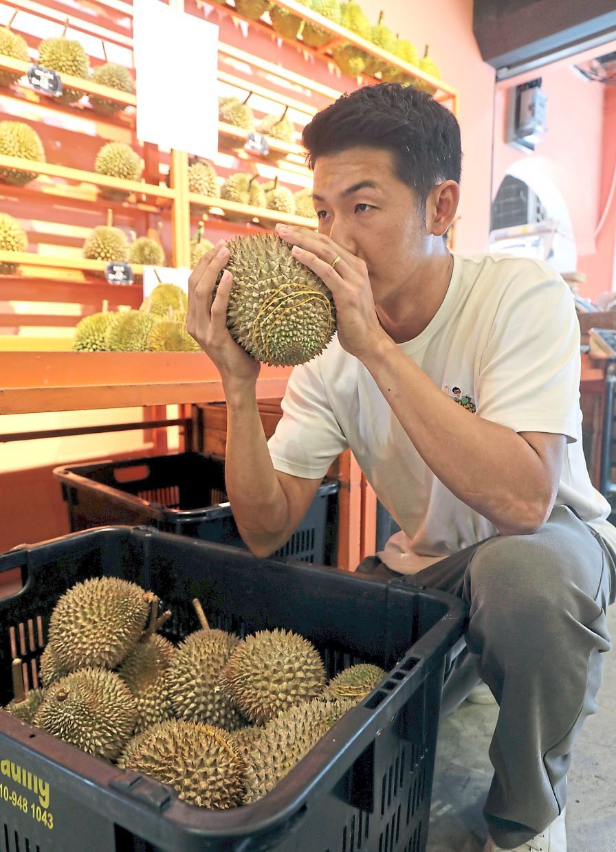 Interview with MyBolehBoleh influencer Edison Ang and the work he is doing to educate the China market on Malaysian durian.—SAMUEL ONG/The Star