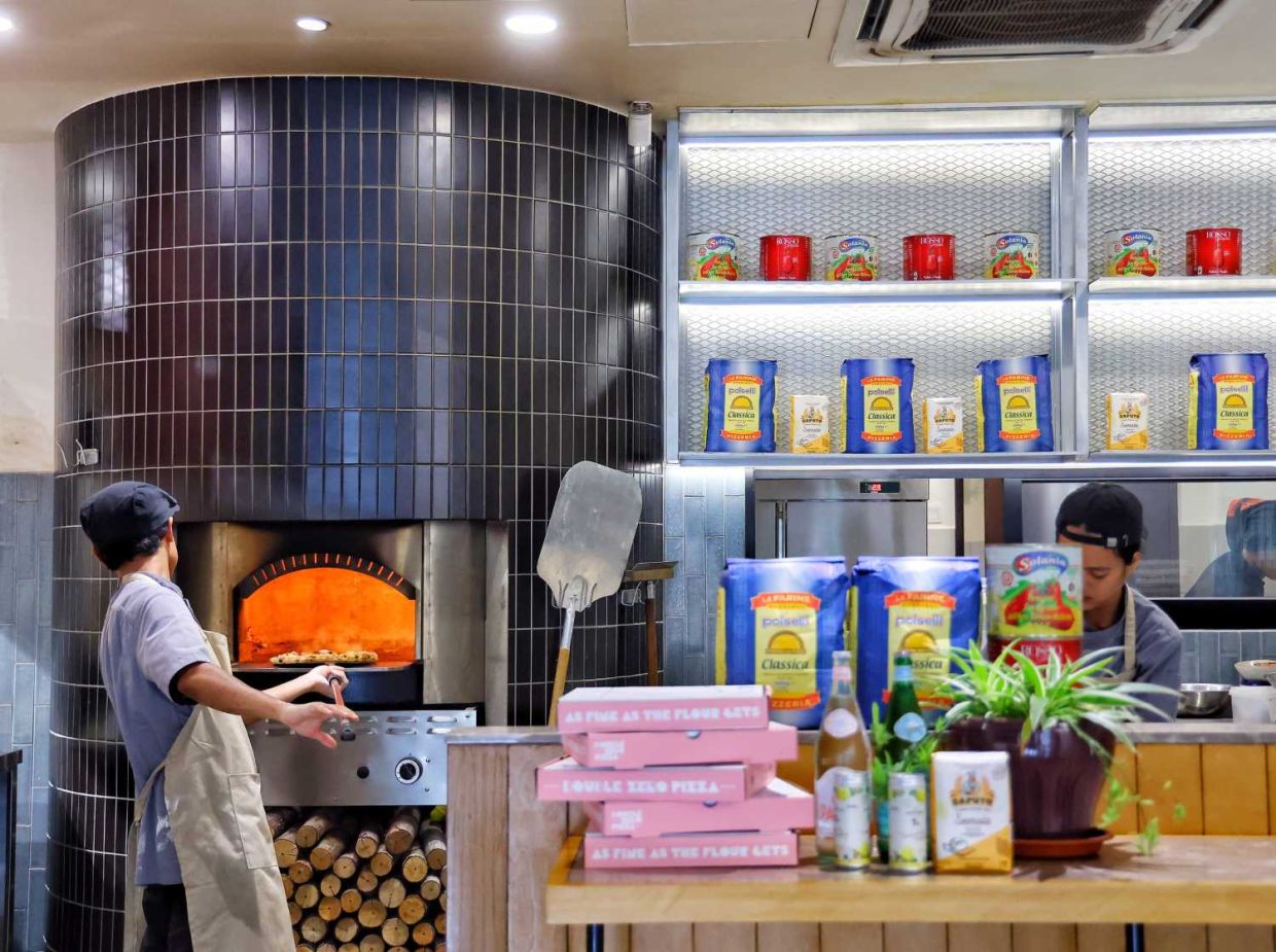 Launching Double Zero Pizza.— MUHAMAD SHAHRIL ROSLI/The Star