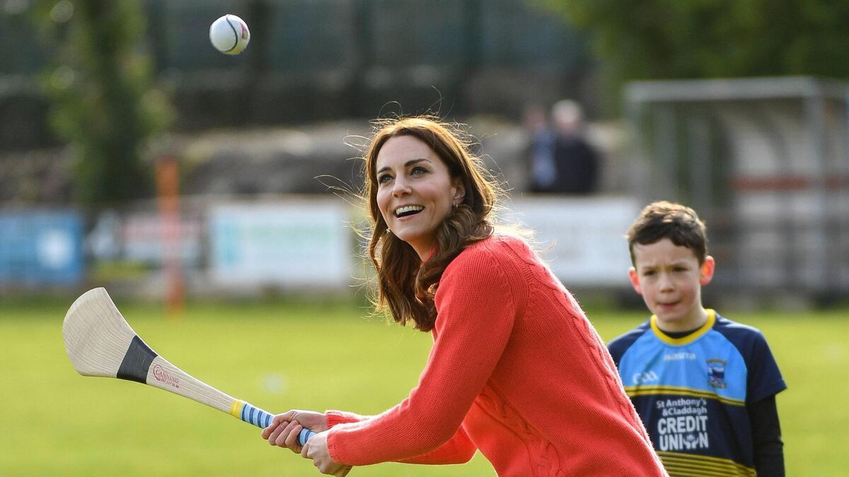 5 March 2020; Catherine, Duchess of Cambridge makes an attempt to hit a sliothar with a hurley during an engagement at Salthill Knocknacarra GAA Club in Galway during day three of her visit to Ireland. Photo by Sam Barnes/Sportsfile
