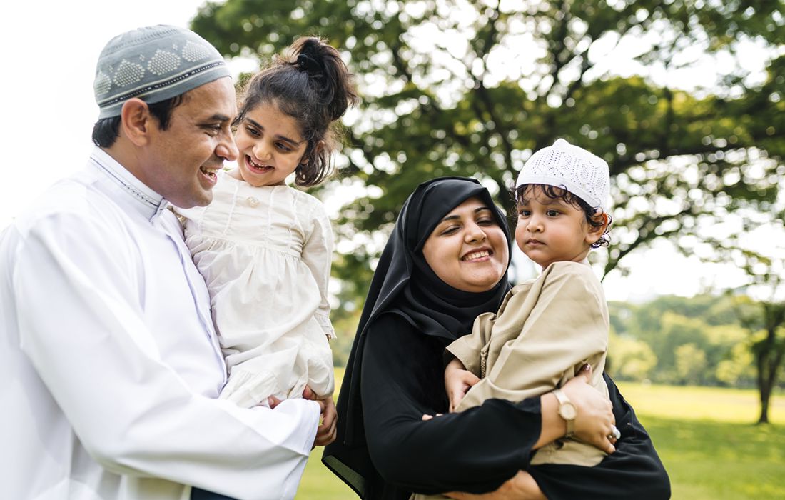 Muslim family having a good time outdoors