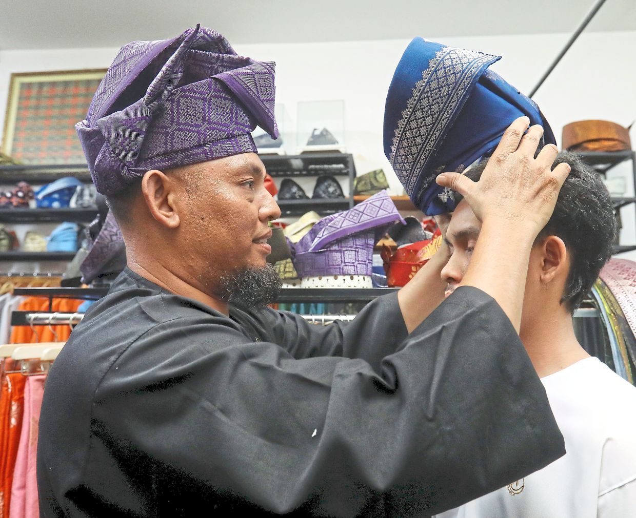 Coverstory on Herin Mansor, pembuat tanjak dan busana tradisional lelaki beridentiti Melayu kontemporari. — AZLINA ABDULLAH/The Star