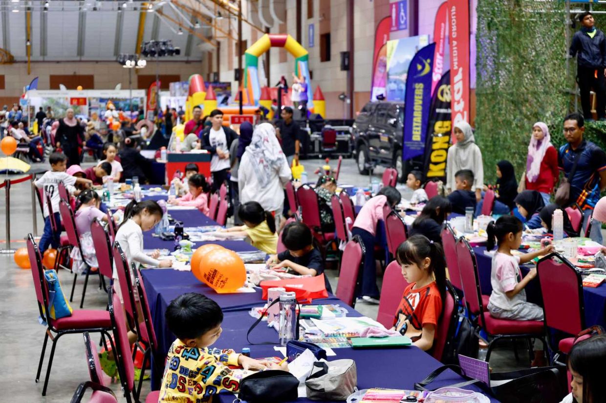 Attendees immerse themselves in a day of diverse events at The Great Outdoor Carnival Malaysia, including 