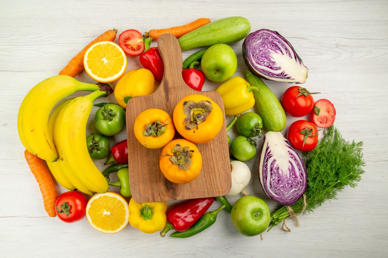 top view vegetable composition with fruits on the white background salad color healthy life photo diet ripe