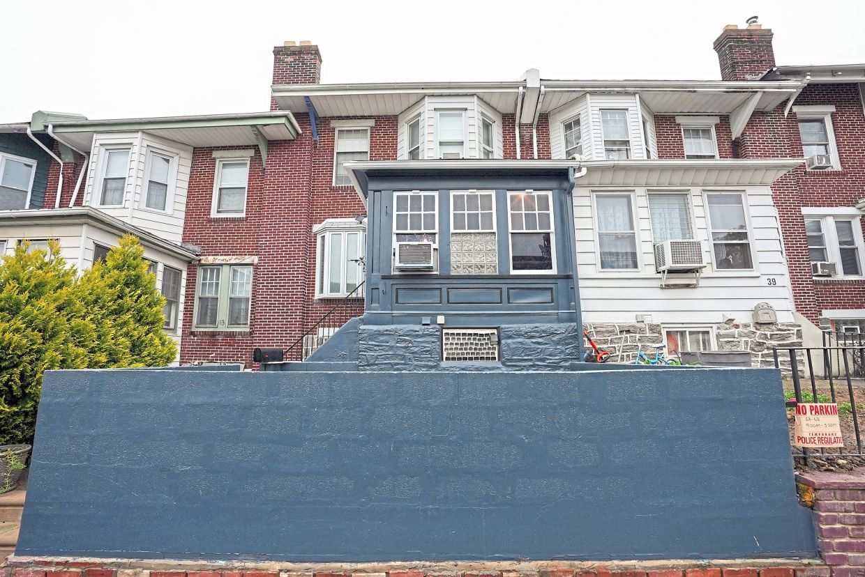 Exterior of The Collage Barrage home, as seen on Ugliest House In America, Season 6.