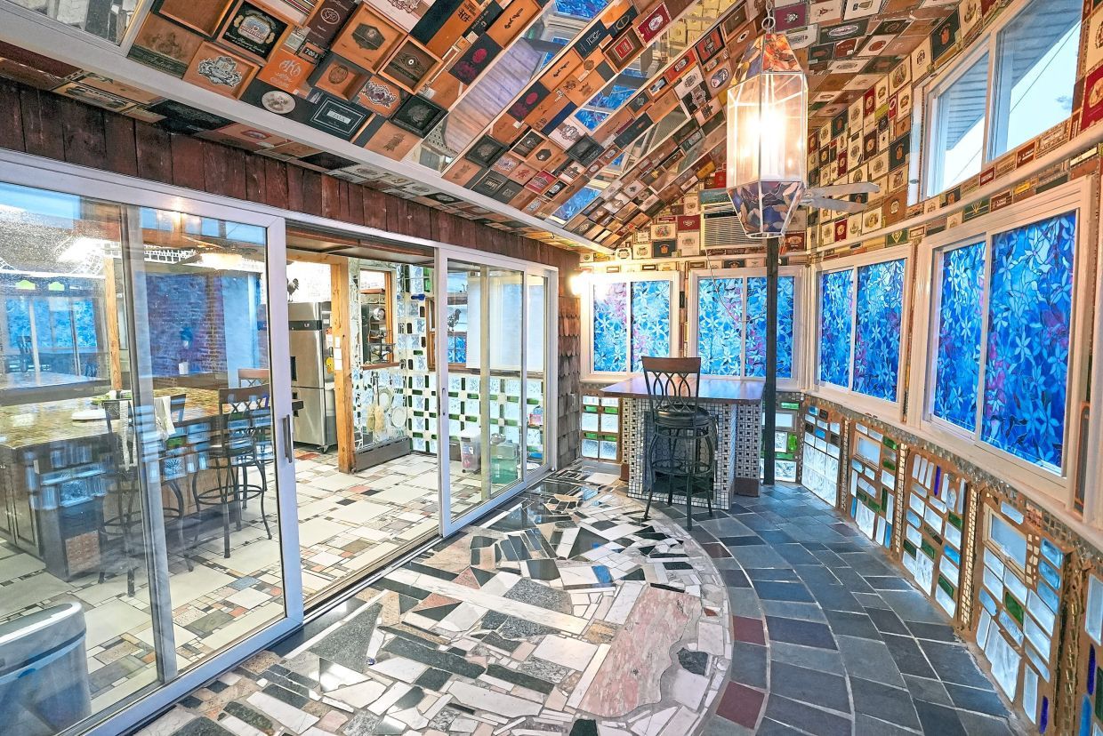 Dining room of The Collage Barrage home, as seen on Ugliest House In America, Season 6.