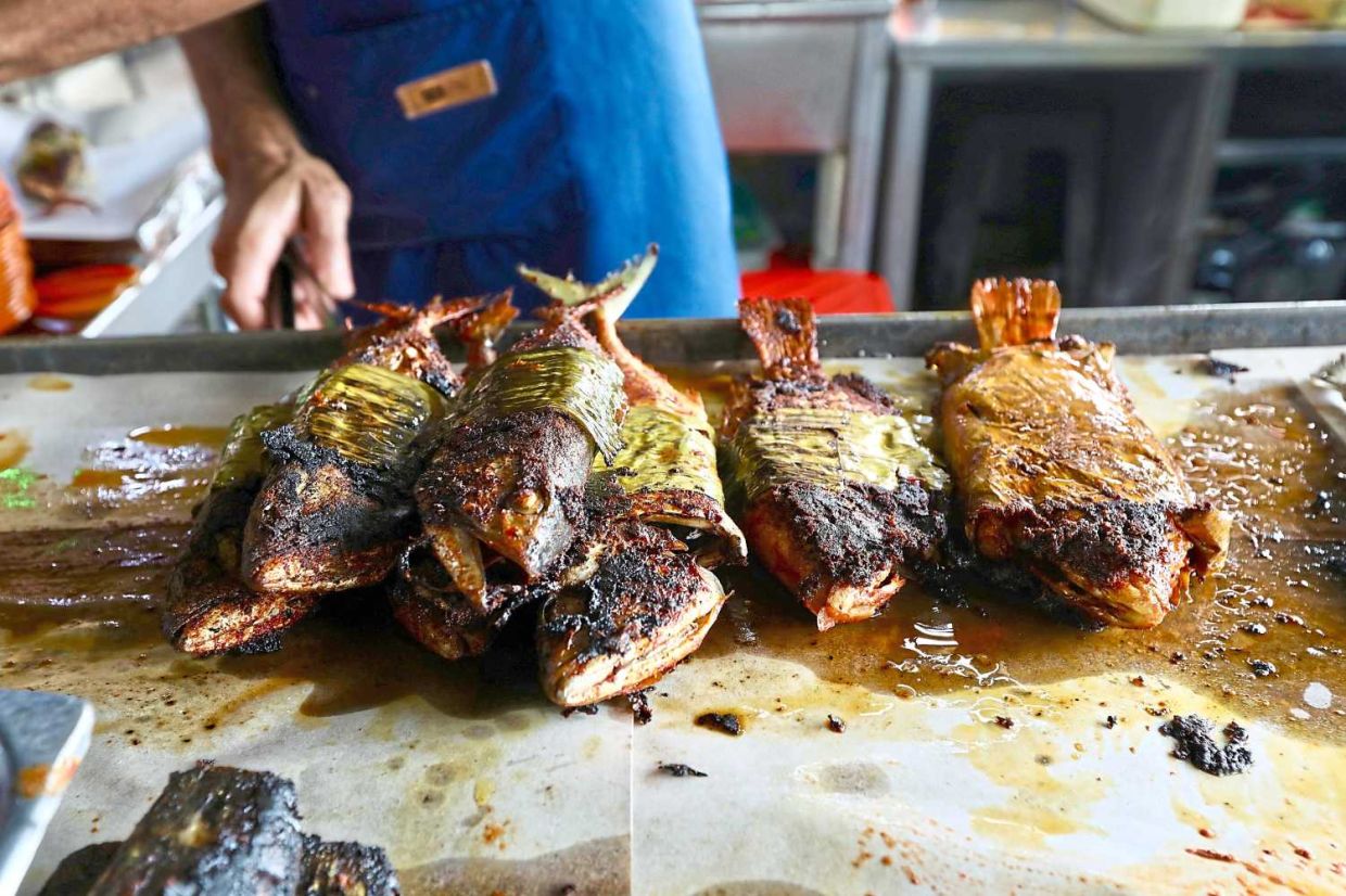 Interview ikan bakar stalls at Jalan Bellamy which have been operating there for more than 40 years. —Low Lay Phon/The Star