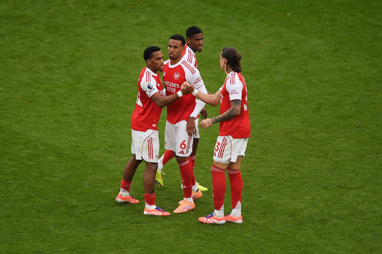 LONDON, ENGLAND - OCTOBER 26: Jurrien Timber, Gabriel Magalhaes, Cristhian Mosquera and Riccardo Calafiori of Arsenal interact during the Premier League match between Arsenal and Crystal Palace at Emirates Stadium on October 26, 2025 in London, England. (Photo by Alex Burstow/Arsenal FC via Getty Images)