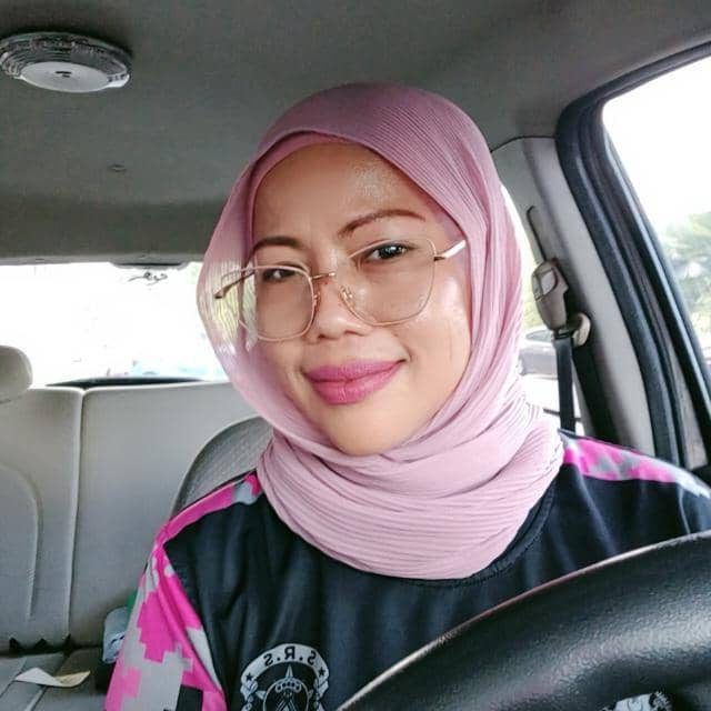 Breakfast seller Maryati Ibrahim, 46.