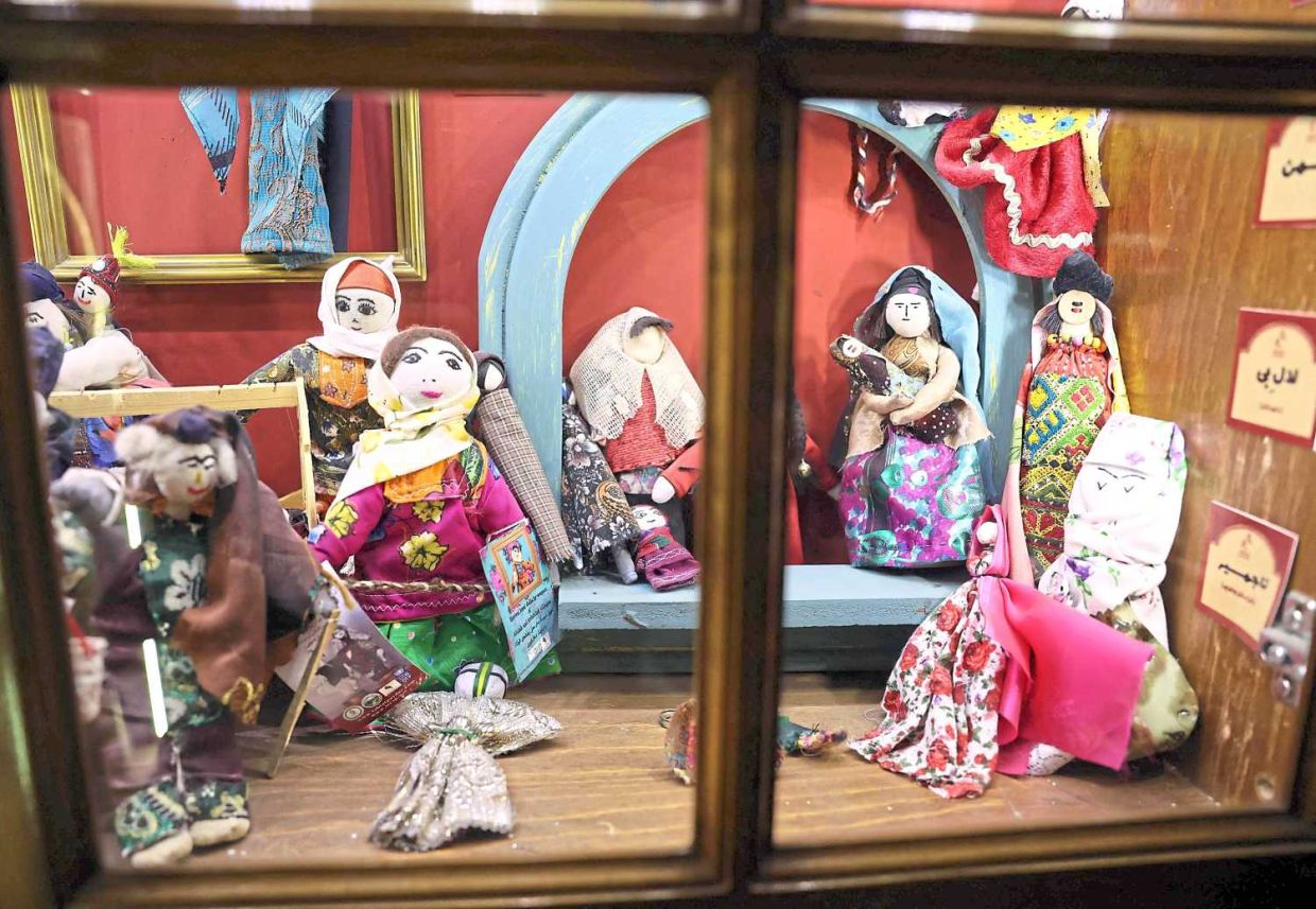 Dolls are displayed at a toy museum in the Iranian capital Tehran on October 26, 2025. (Photo by AFP)