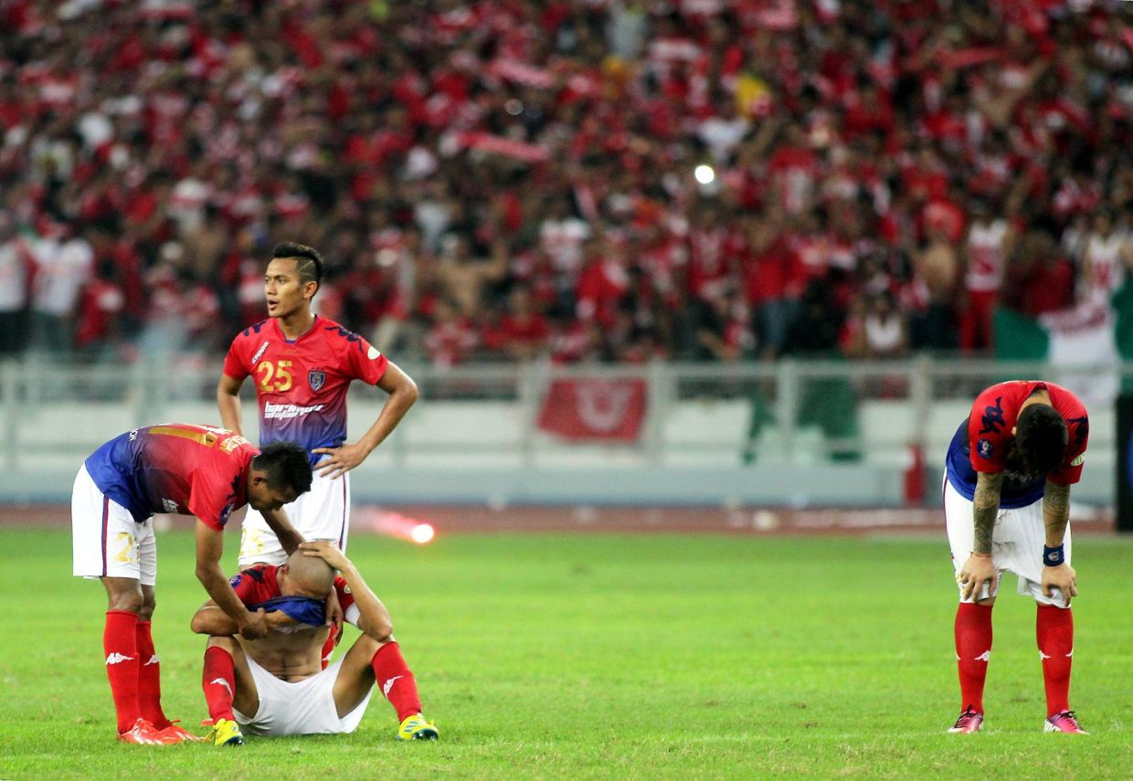 Johor players reactingafter losingtheir Final FA cup match againts Kelantanat Stadium National Bukit on 29 June,2013.Kelantan won 1-0.AZHAR MAHFOF/The Star